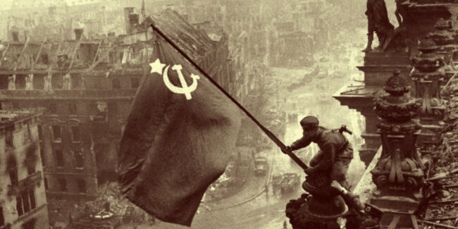 Raising a flag over the Reichstag